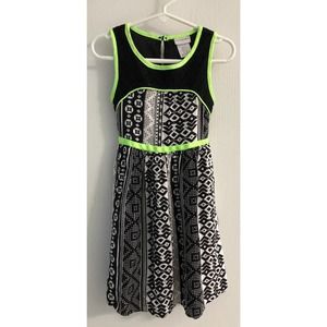 Girls back/white print dress with lime green trim. Size 5.
